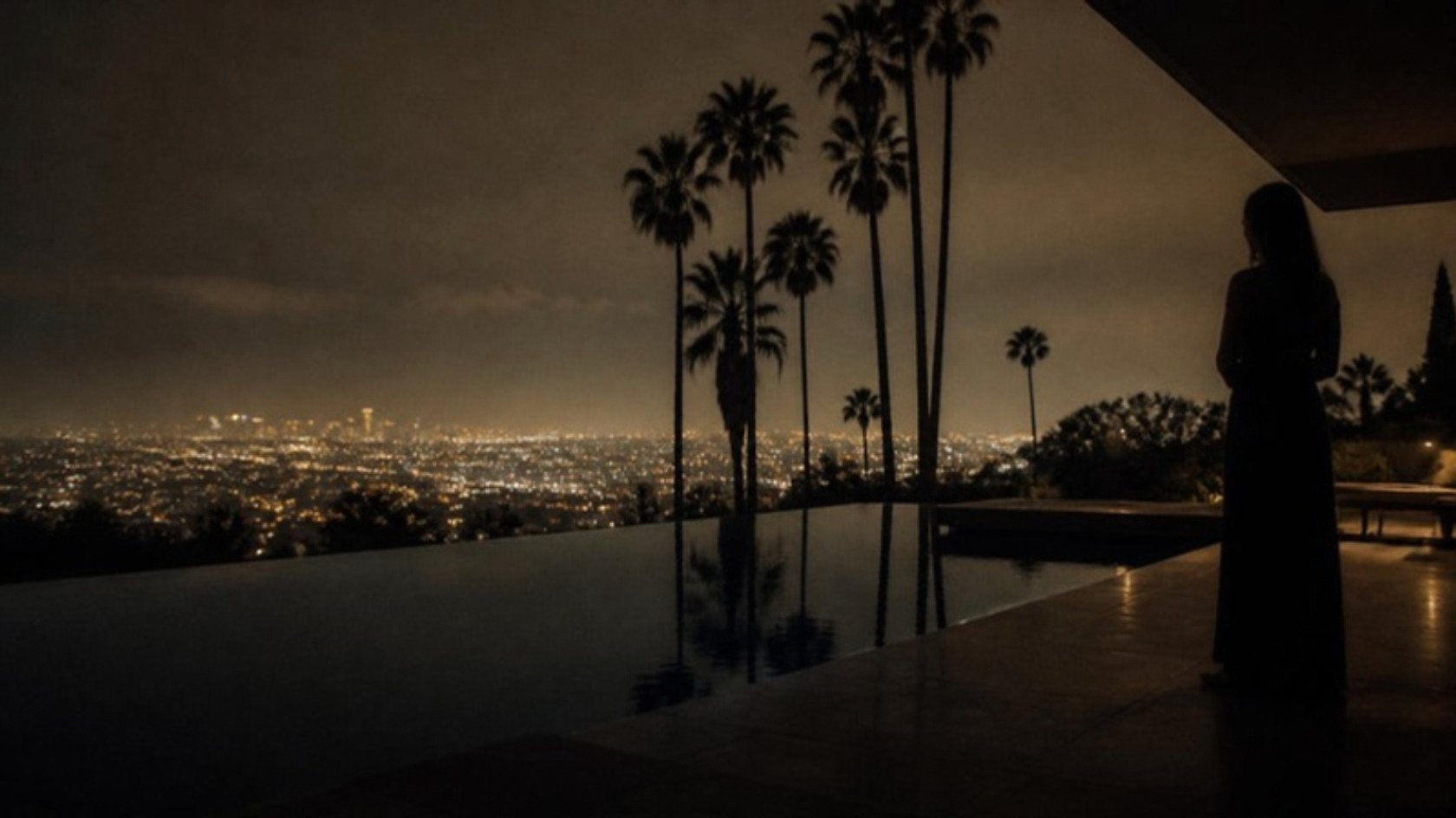 The Hollywood Hills after midnight, the city spread below
